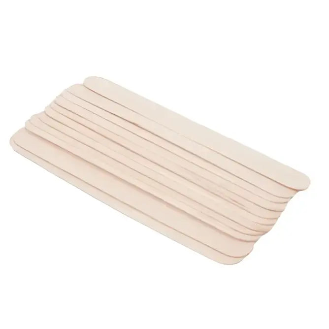 A stack of light beige wooden tongue depressors made from natural wood for medical and craft use by killer ink