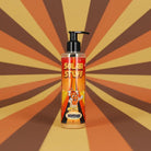 A clear plastic bottle with black pump labeled solar stuff in orange featuring a cartoon character by kosmos