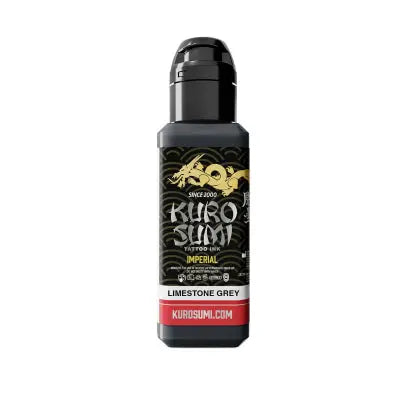 Black plastic bottle of kuro sumi imperial tattoo ink in limestone grey with gold dragon logo from marble stone set