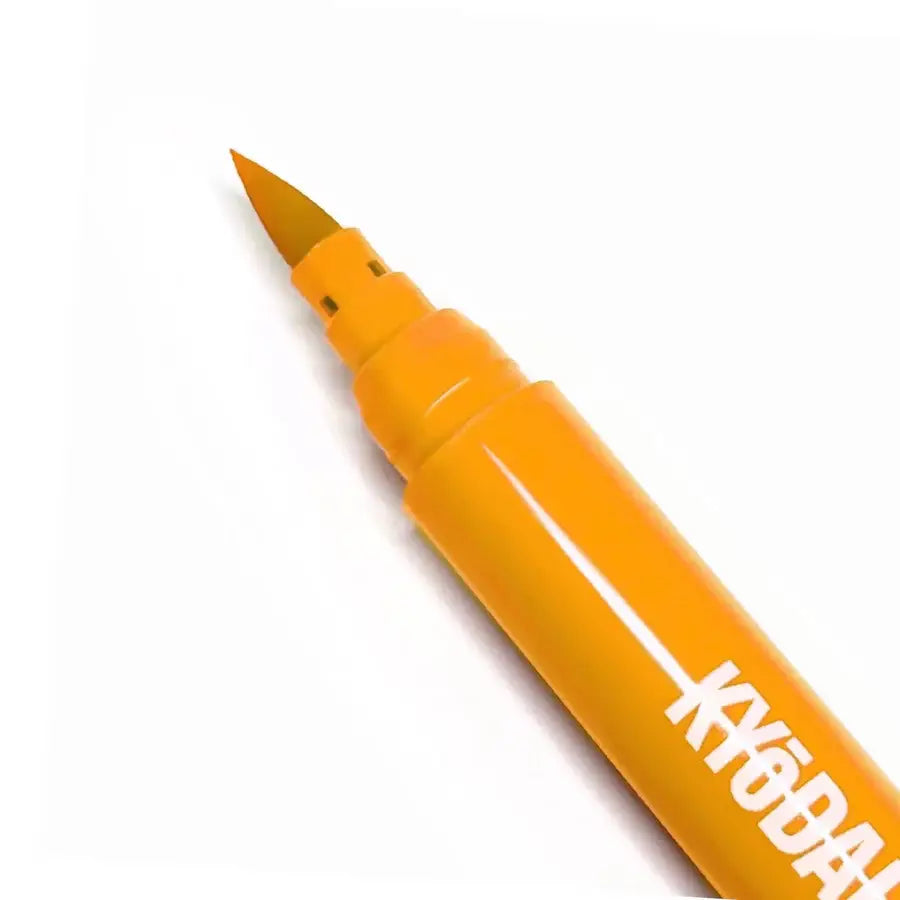 Bright orange Kyodai firm-tip brush pen with a fine pointed tip designed for precise writing and drawing