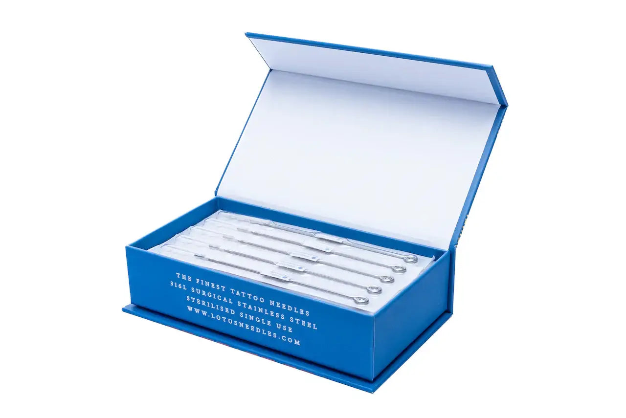 Blue gift box containing six silver surgical stainless steel lotus bar needles round liner for tattooing