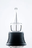 Nexus round liner cartridge with clear glass needle tip black textured grip and metallic base for precise tattooing