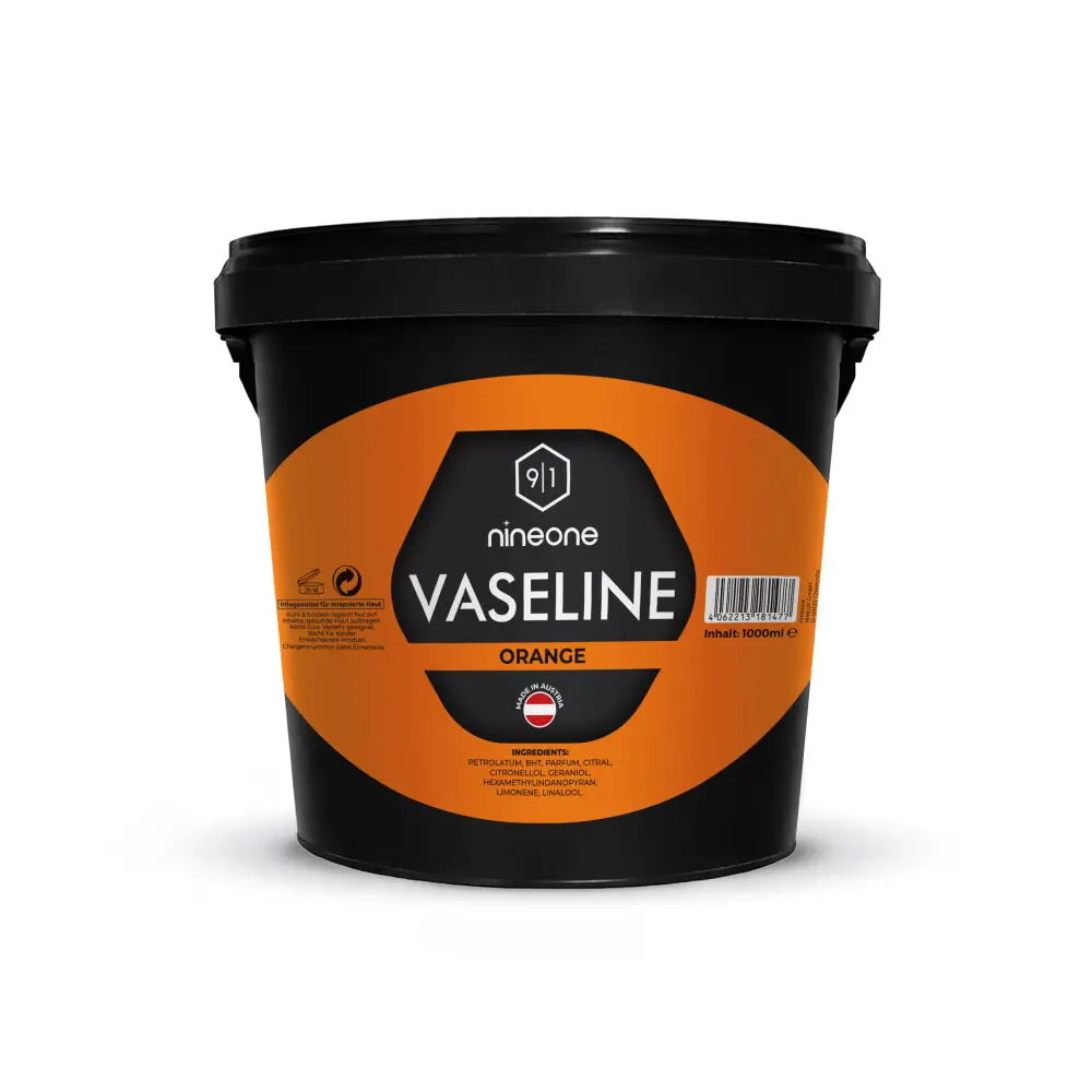 A black plastic bucket of nineone vaseline orange 1000 ml designed for stressed skin care