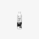 White cylindrical bottle of piranha green soap menta with minimalist black label and white cap 1l