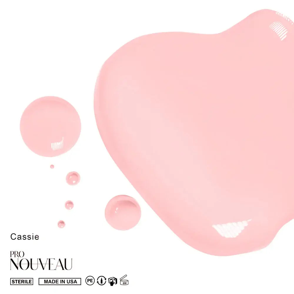 A soft pink glossy nail polish shade cassie from pro nouveau blush collection pmu pigment for professional use