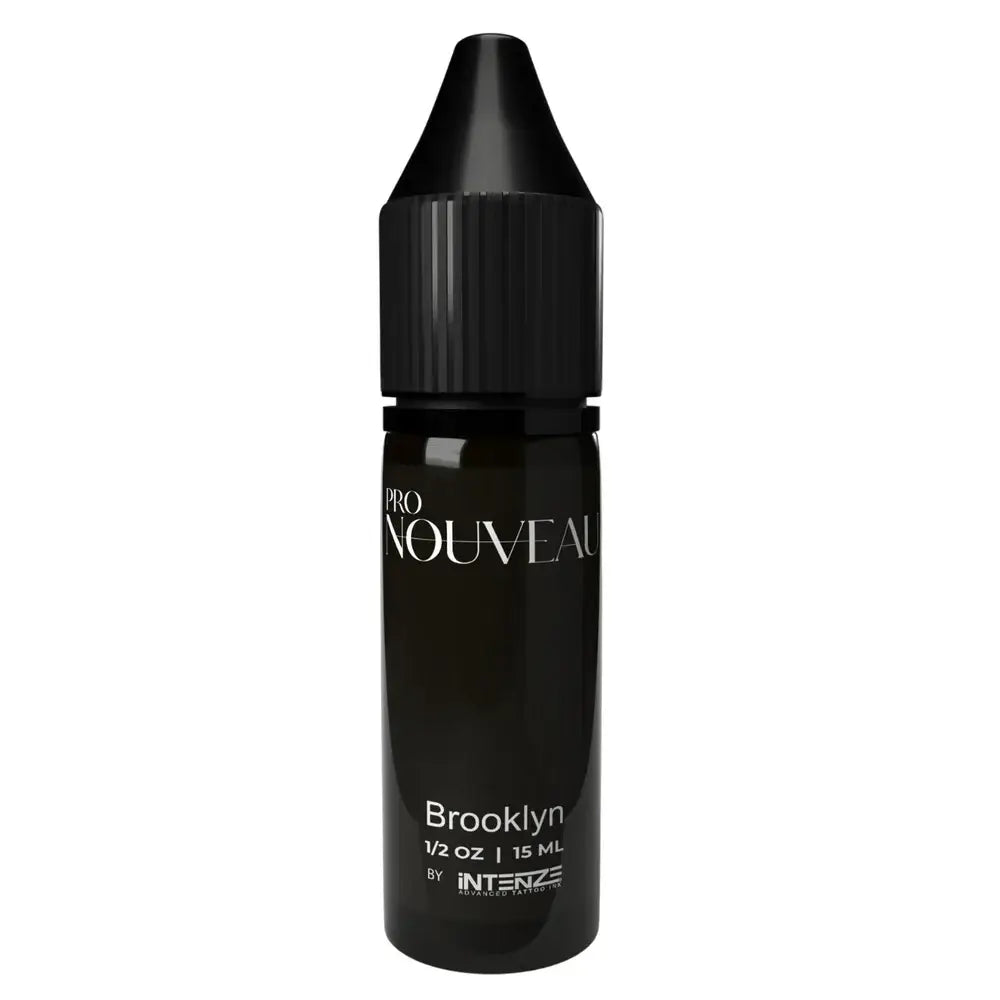 Black glass bottle with ribbed cap labeled pro nouveau brooklyn 15 ml pmu pigment from brows collection