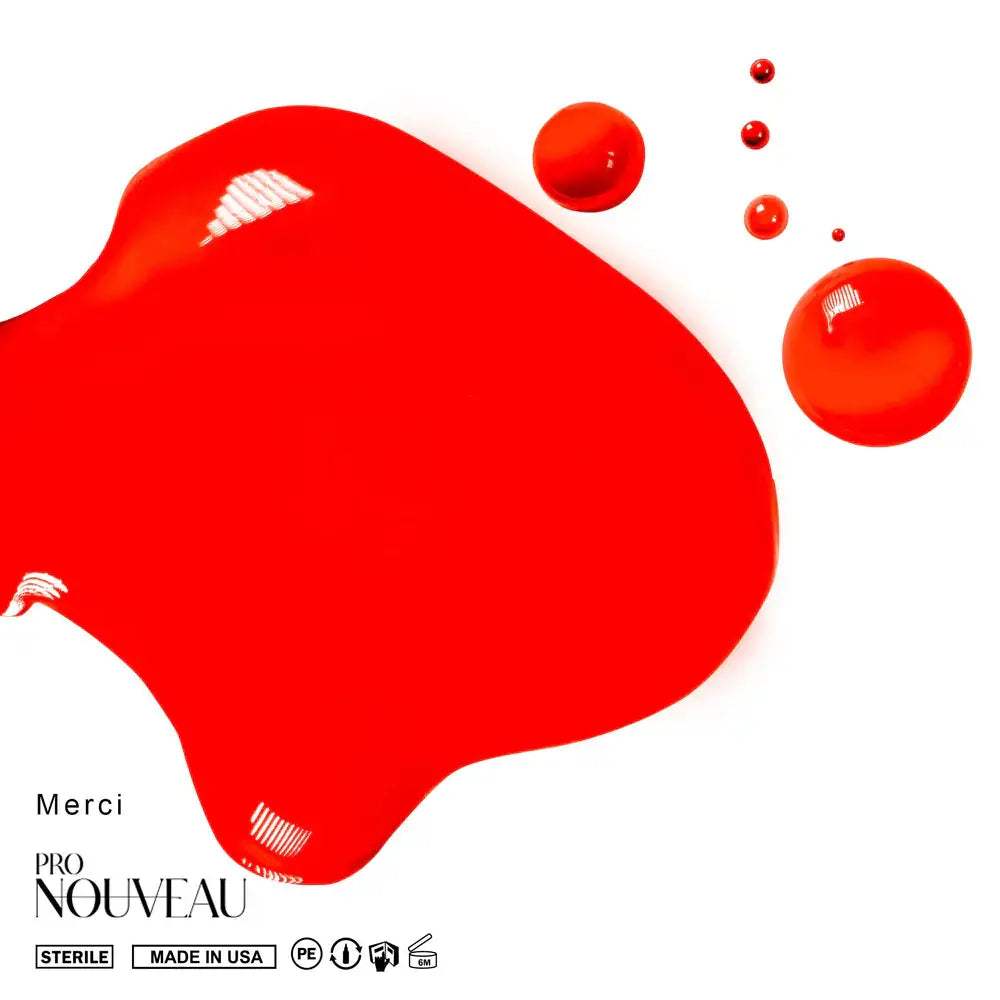 Vibranter roter PMU-Pigment aus der PRO NOUVEAU Lips Collection mit glänzenden, reflektierenden Kugeln, die in der Nähe schweben