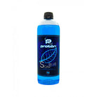 A translucent blue bottle of proton blue soap concentrated with panthenol alantoin and aloe vera with black cap and glowing leaf label