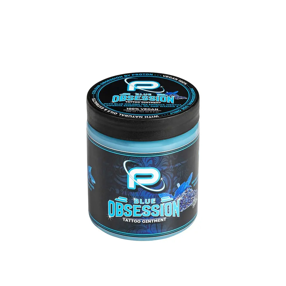 Blue obsession tattoo ointment in a black jar with teal and blue labeling from proton colours obsession tattoo butter 250ml