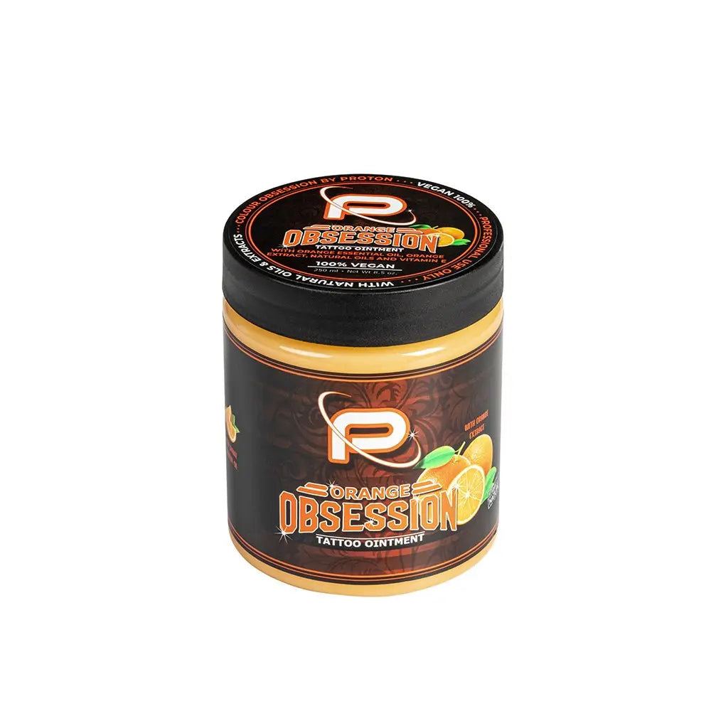 Proton colours obsession tattoo butter in a glossy black and orange jar made by nature for tattoo care 250ml