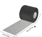 A roll of black textured underwrap foam tape with a silver metallic surface for drylock pad protection elastic and breathable