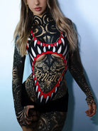 Black and red graphic bodysuit trikini with white teeth design from VICE ATTITUDE for bold swimwear looks
