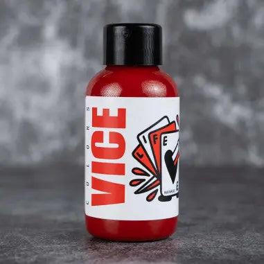 Red plastic bottle with black cap and white label featuring bold red vice text and playing cards graphic for vice bleeding red product