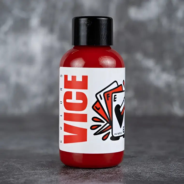 Red plastic bottle with black cap and white label featuring bold red vice text and playing cards graphic for vice bleeding red product