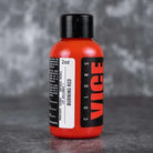 Vice burning red 2oz dye bottle with a black cap and bold red label for vibrant hair coloring