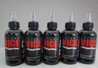 Five black plastic vice brand tattoo ink bottles with clear nozzles labeled in red from vice greywash set bundle