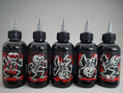 Five black plastic bottles with clear caps and red and white skeleton designs from vice greywash set bundle