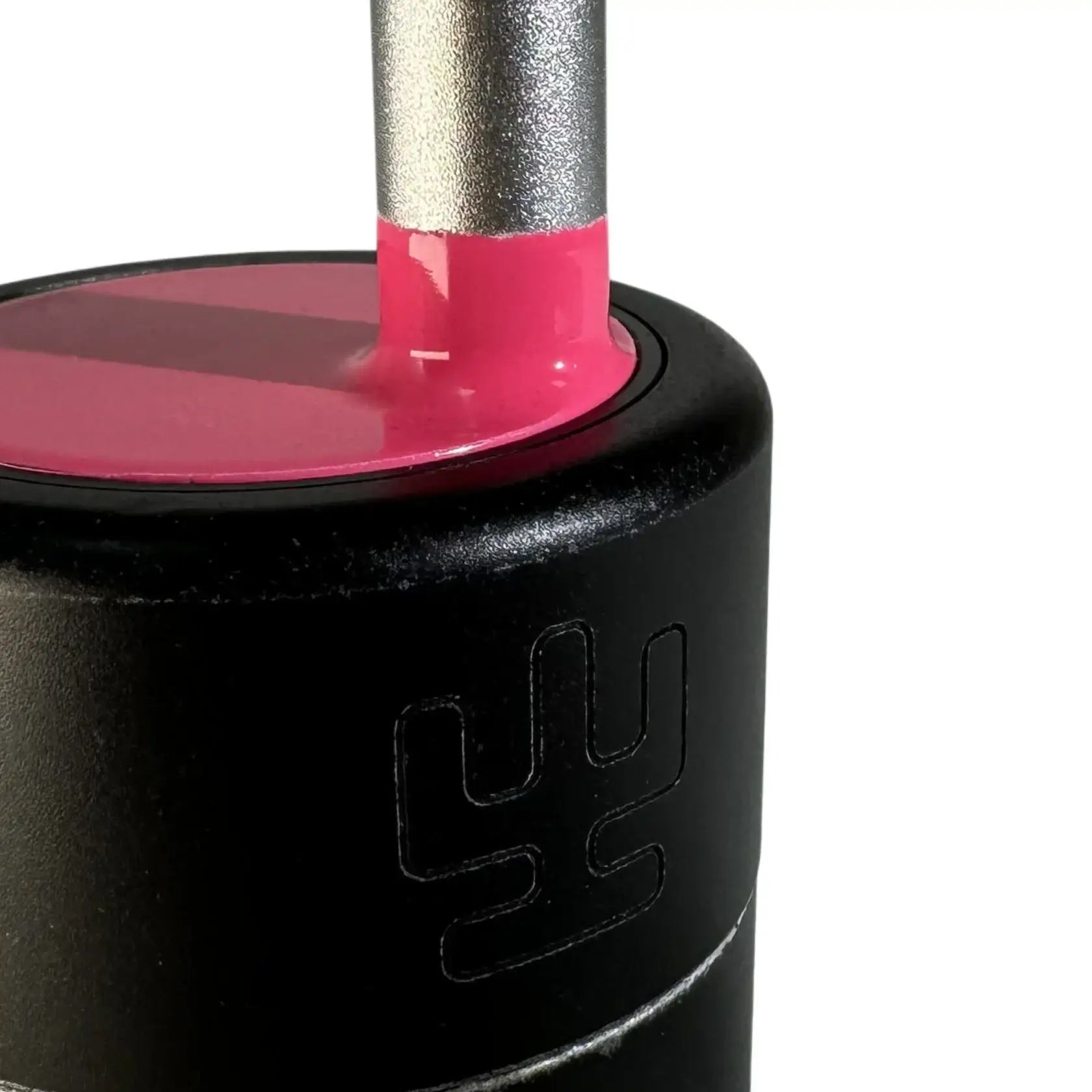 Black cylindrical weight with vibrant pink top and silver handle from VLAD BLAD magic balance grip product