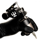 Black VLAD BLAD tattoo machine with sleek ergonomic design metallic accents for precise tattooing balance grip