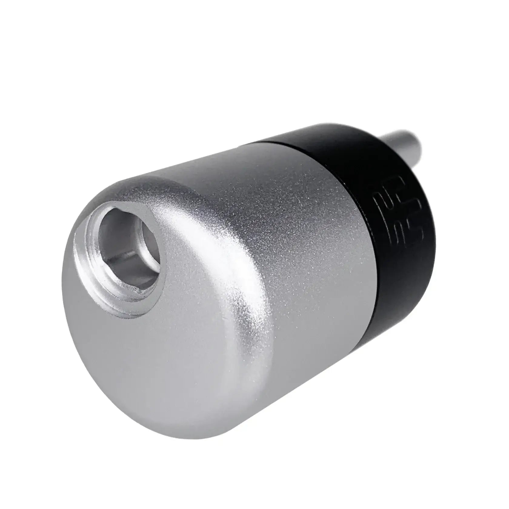 Silver and black cylindrical vladd blad magic balance grip device with threaded opening and embossed logo visible