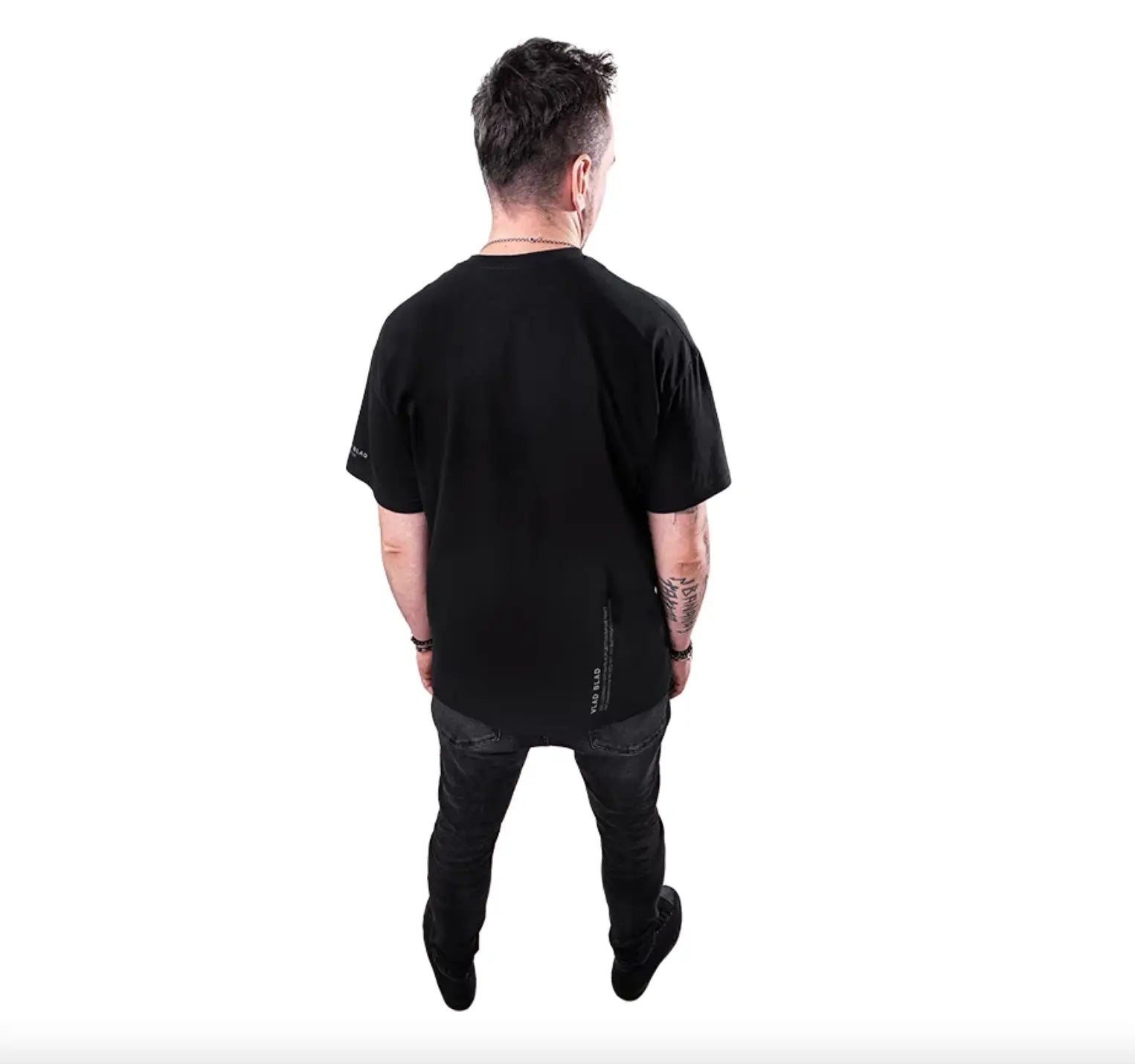 Black short-sleeved cotton shirt with subtle vertical text detail along the side seam from VLAD BLAD collection