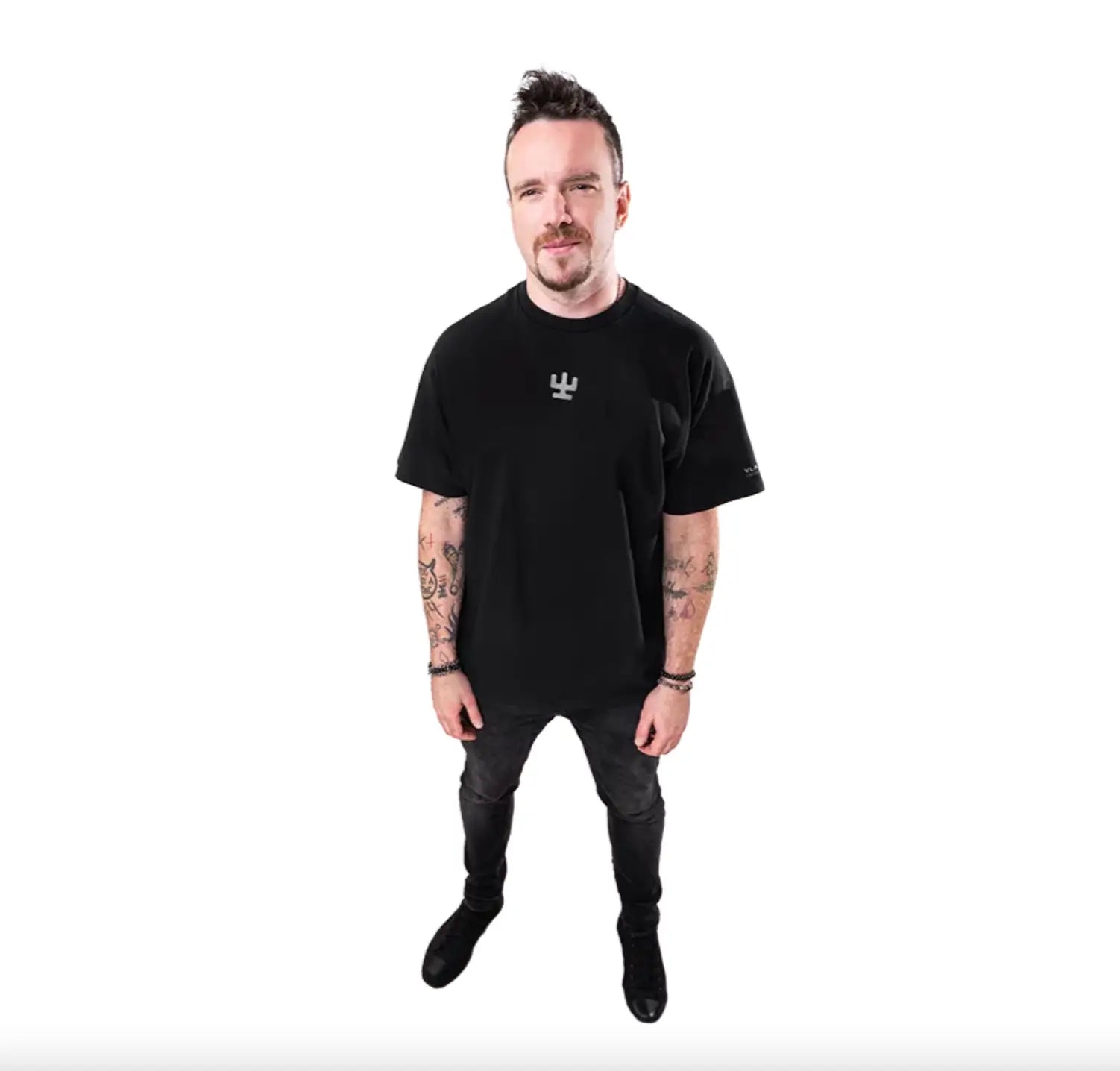 Black short-sleeved VLAD BLAD shirt with a small white chest logo and subtle text along the sleeve