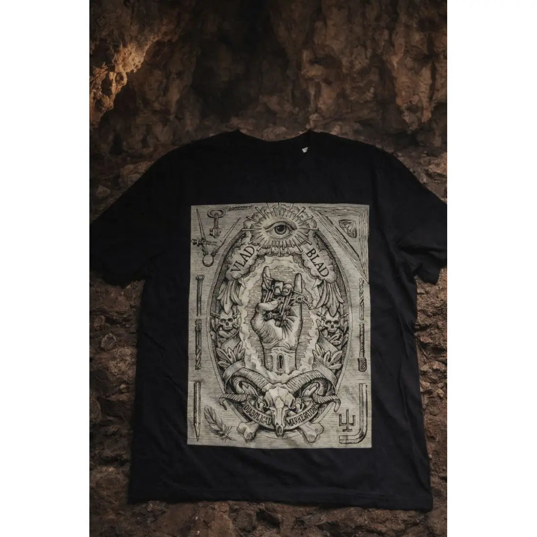 Black vlad blad t-shirt with detailed black and white eye and hand graphic surrounded by skulls and occult symbols