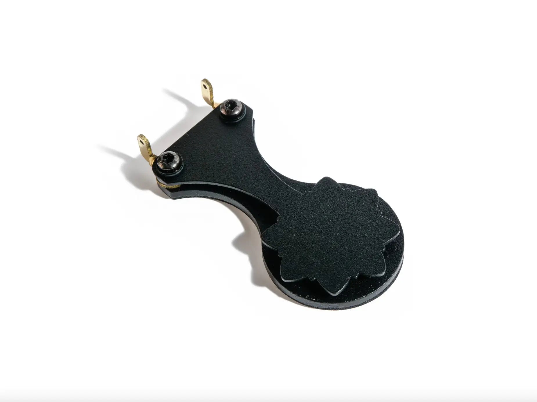 Vlad blad ultralight footswitch featuring a black plastic clip with gold-tone metal petal-shaped attachments