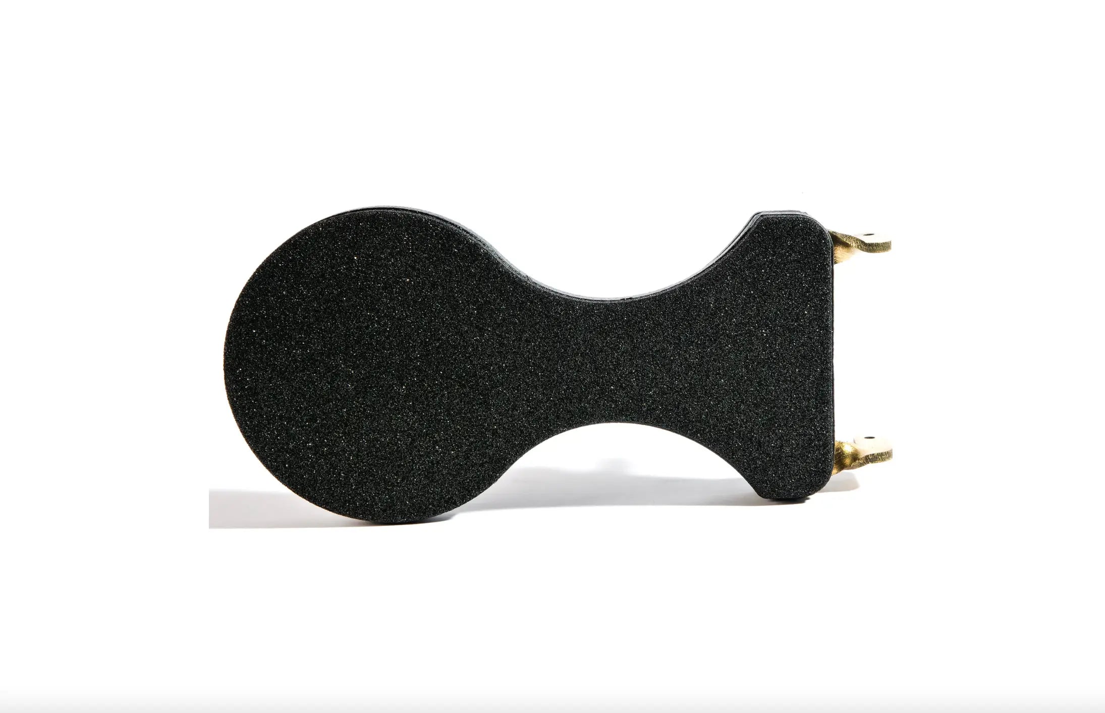 Black textured foam grip with gold metal attachments on the vlad blad ultralight footswitch for easy control