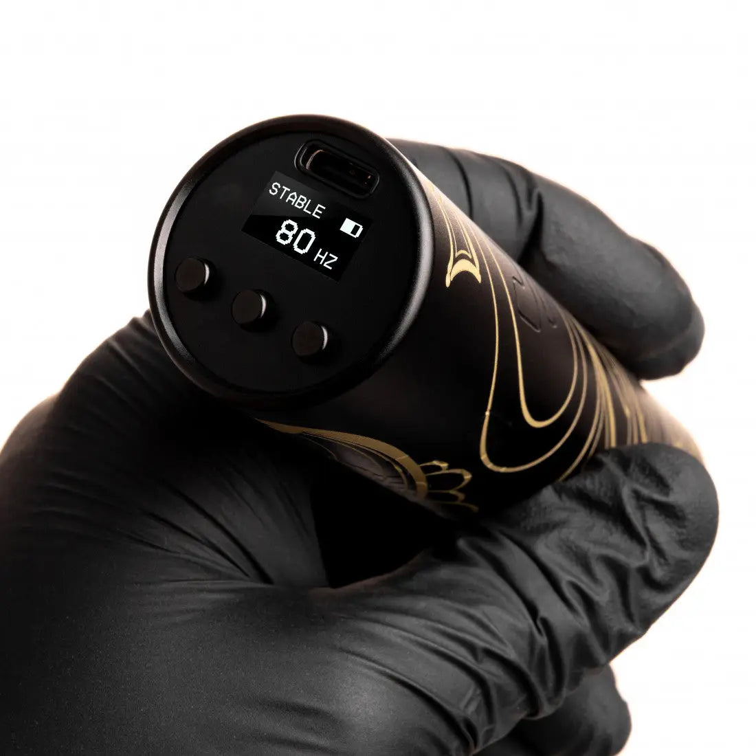Black and gold VLAD BLAD Ultron 4 tattoo machine by Kubec with digital display showing stable 80 hz and three control buttons