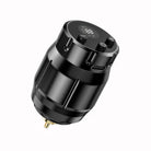 Black cylindrical wireless tattoo machine power supply with digital display and adjustment knobs for precise control