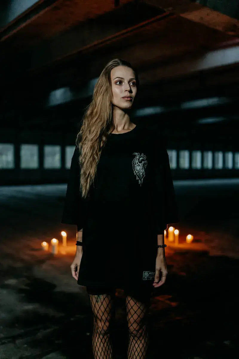 Black oversized unisex t-shirt with white embroidered dragon design on chest from wolfpack abyss hound collection