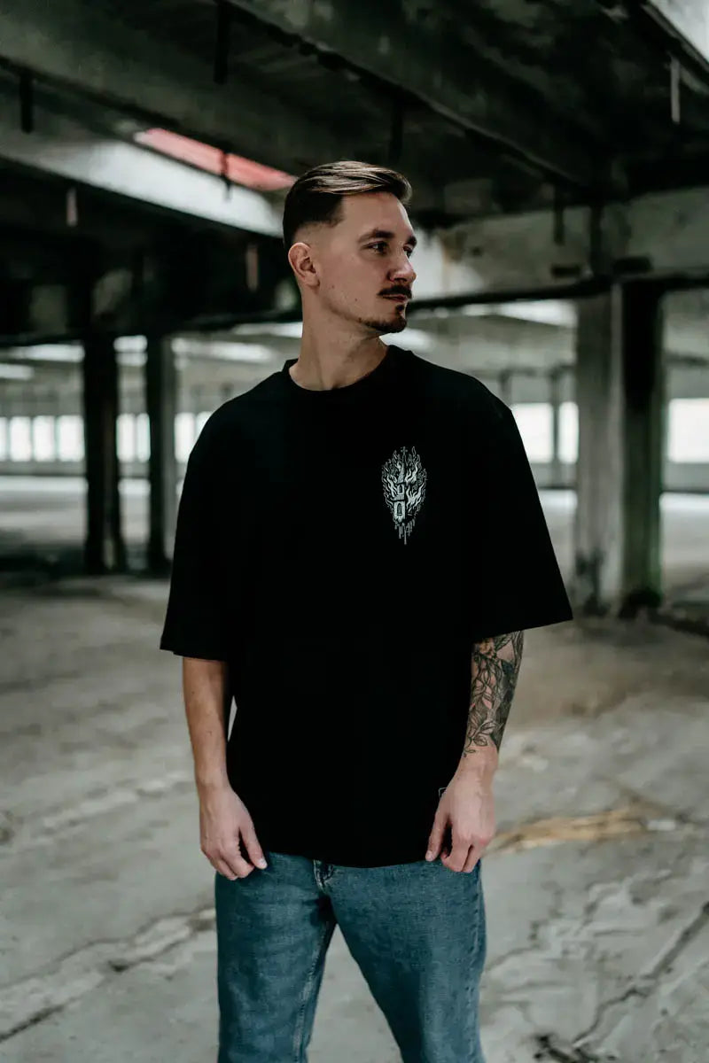 Black ritual oversized unisex t-shirt with a white intricate wolf graphic on the chest in short-sleeved cotton design