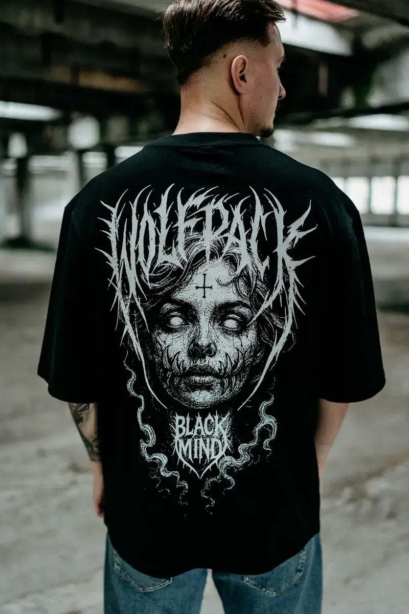Black ritual oversized unisex tee in black with white wolfpack black mind graphic and stylized face design