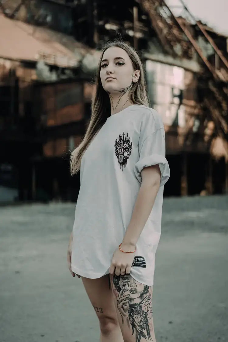 White oversized tee unisex with black wolf head graphic on left chest from wolfpack black ritual collection