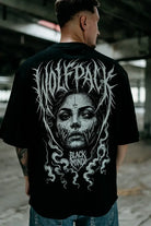 Black oversized unisex short-sleeved cotton tee with white wolfpack stylized face graphic and black mind text