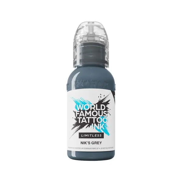 A sleek dark grey world famous limitless tattoo ink bottle with clear cap and bold black and teal branding