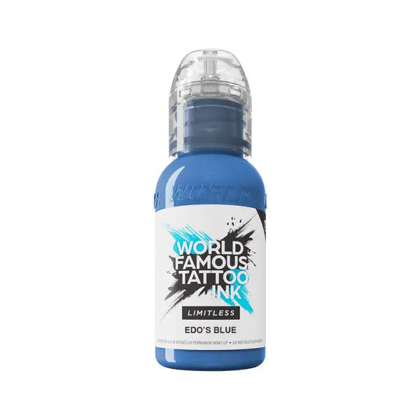 A vibrant blue world famous limitless tattoo ink bottle with a clear plastic cap and bold black teal label graphics